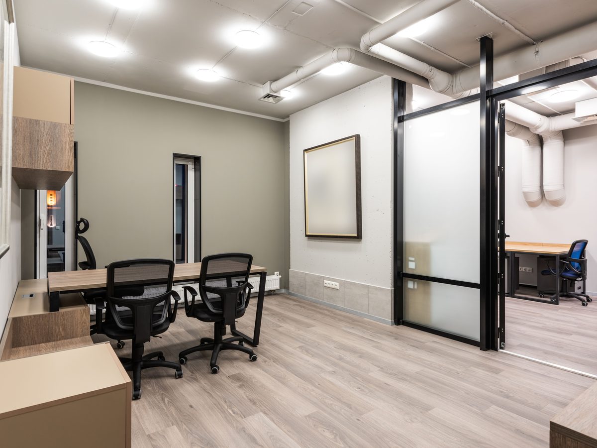 Remodeled commercial office interior with a glass partition